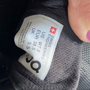 On barely worn black running shoes